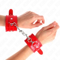 Kink Muñequeras Ajustables con Tachuelas Rojas - Equipamiento BDSM