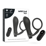 Anilla Pene Con Plug Anal Control Remoto Negro